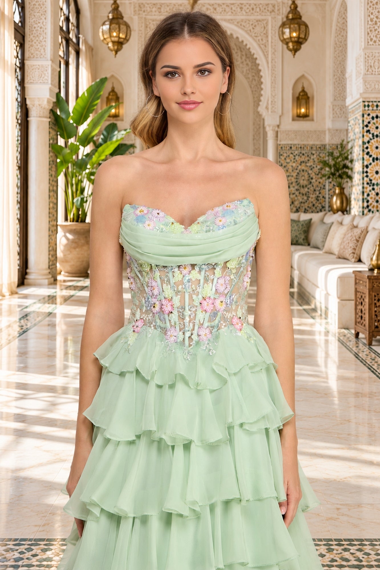 Amelia Couture 9103 strapless mint green gown featuring a beaded corset bodice, floral embroidery, and a tiered ruffled chiffon skirt.